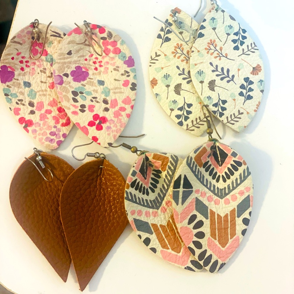 Four pairs of leather earrings. Used but excellent condition.